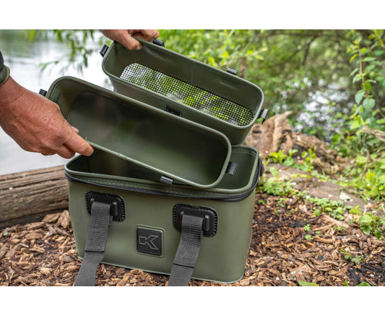 Комплект футери и сито KORUM EVA TACKLE & BAIT STATION with removable containers shown outdoors.