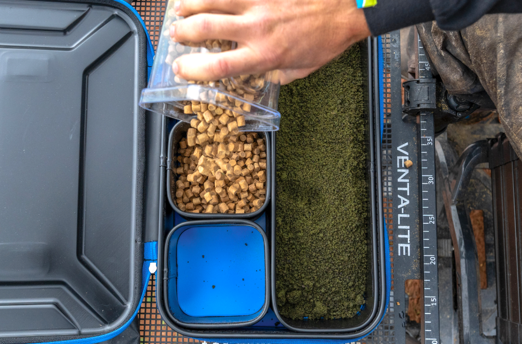 Кутия за стръв PRESTON Supera X Eva System with various bait components being organized.
