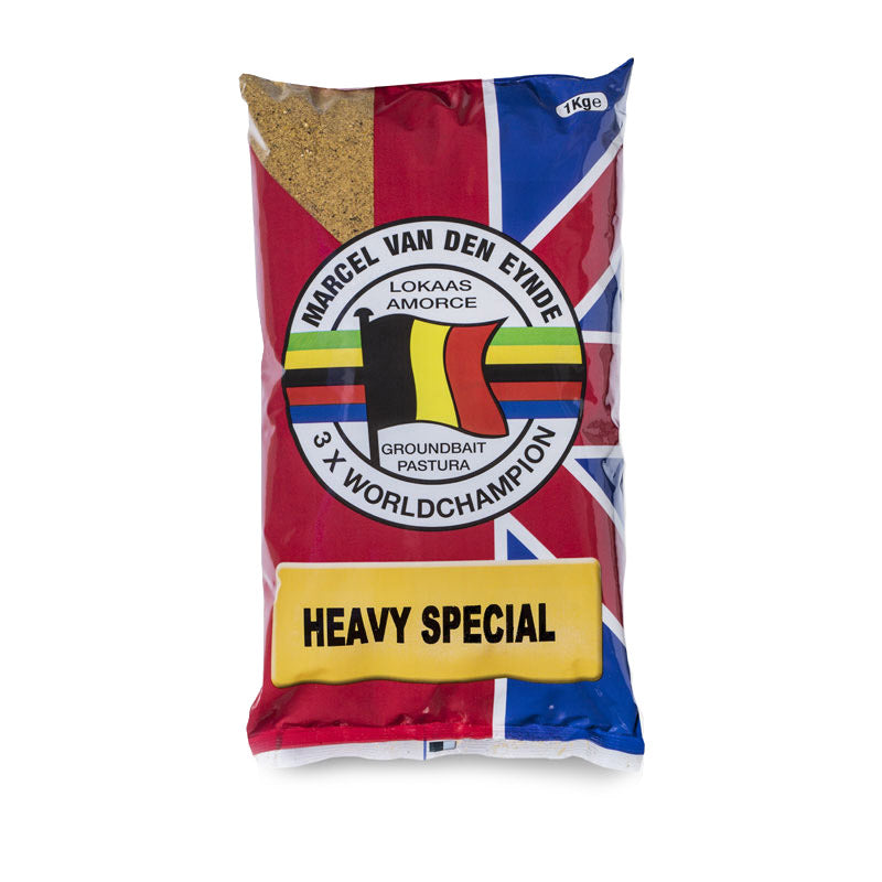 Захранка Van Den Eynde HEAVY SPECIAL - 1kg в пакет с цветна графика и информация за продукта.