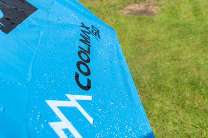 Чадър PRESTON COOLMAX 50" BROLLY with water droplets on its vibrant blue fabric.