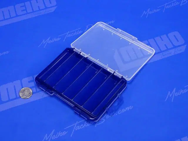 Кутия за примамки MEIHO REVERSIBLE F-86 CLEAR/NAVY отворена с 10 отделения на син фон.