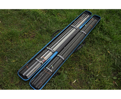 Твърд калъф PRESTON HARDCASE COMPACT KIT SAFE with fishing rods on grass.