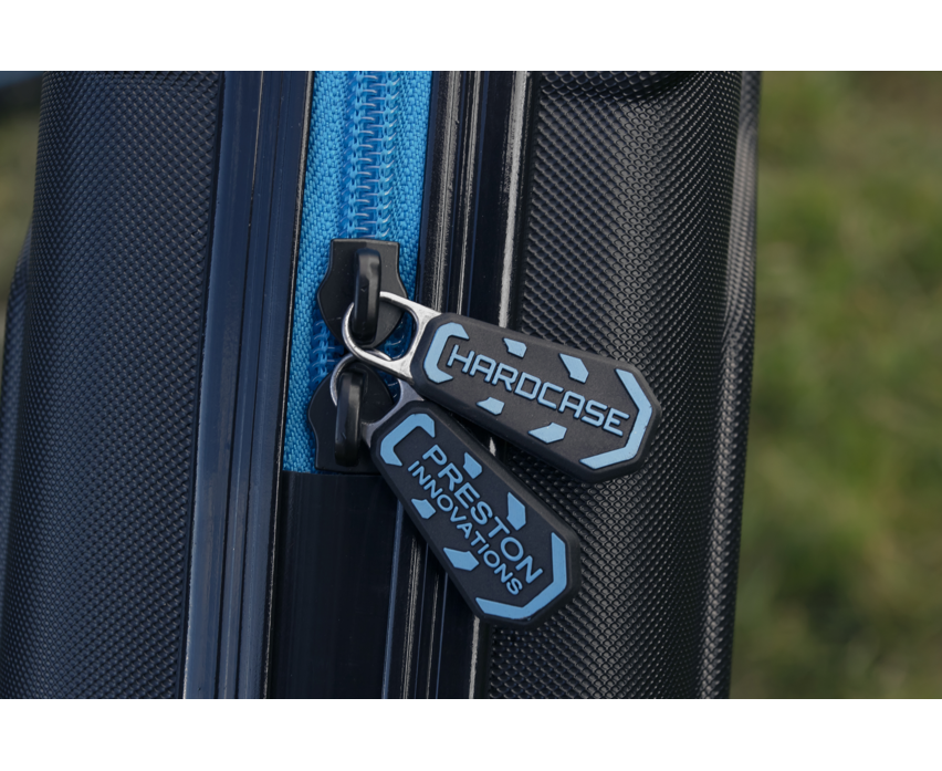 Твърд калъф PRESTON HARDCASE COMPACT KIT SAFE zipper details showing brand tags.