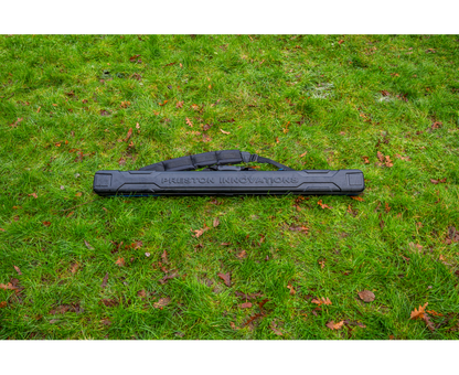 Твърд калъф PRESTON HARDCASE COMPACT KIT SAFE on grassy ground.