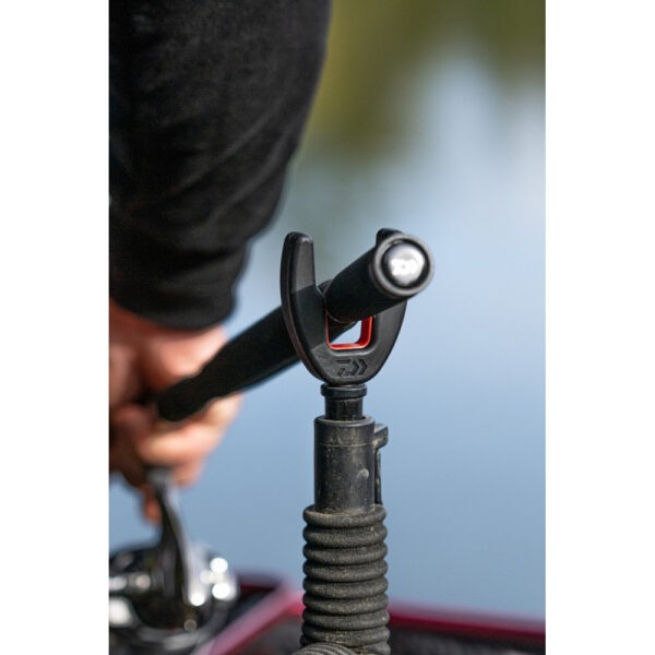 Заден държач за въдица  - DAIWA NZON DUAL REAR ROD REST in use with fishing rod by the water.