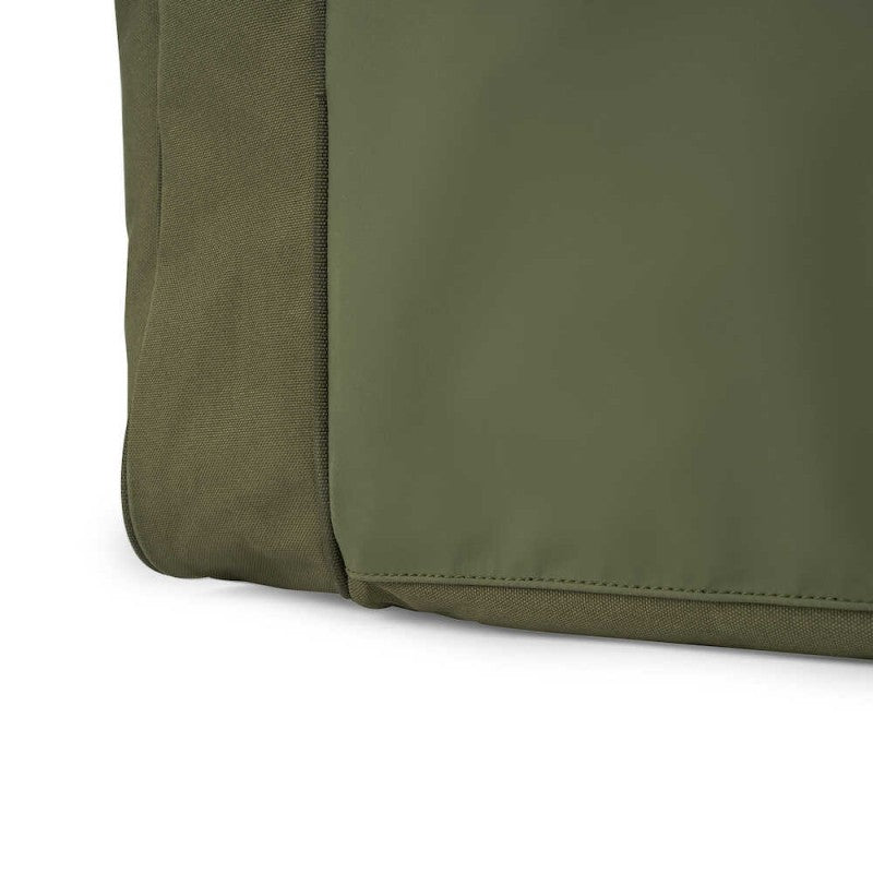 Сак AVID RVS CARRYALL - MEDIUM close-up of the durable exterior fabric in green.