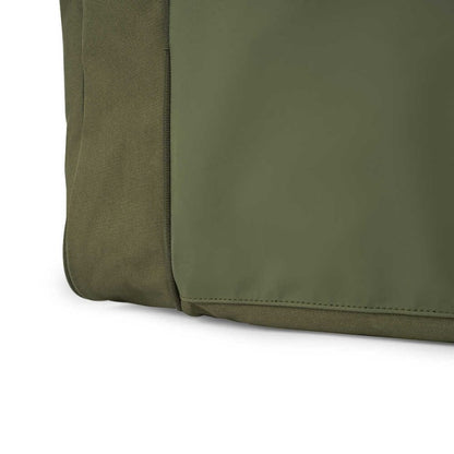 Сак AVID RVS CARRYALL - MEDIUM close-up of the durable exterior fabric in green.