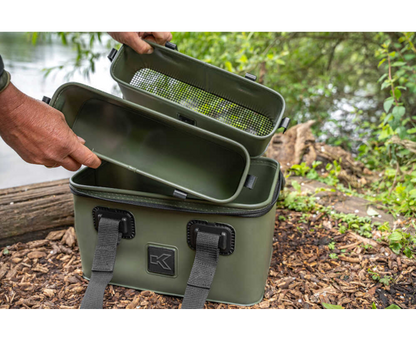 Комплект футери и сито KORUM EVA TACKLE & BAIT STATION with removable containers shown outdoors.