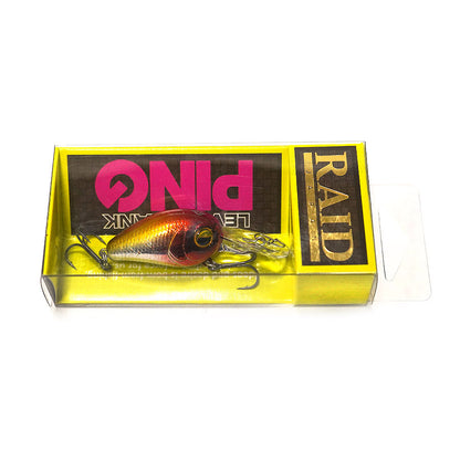 Воблер RAID LEVEL CRANK PING - 3.25cm/3.5gr - Floating in packaging, showcasing the vibrant design.